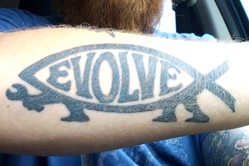 evolve arm tattoo